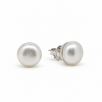A pair of classic freshwater pearl stud earrings with silver posts, shown on a clean white background.