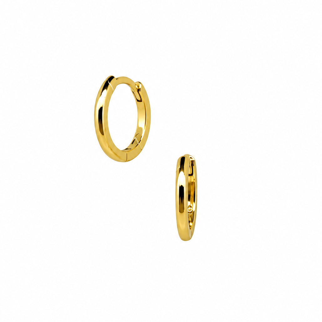 Two small gold huggie hoop earrings shown on a plain white background.
