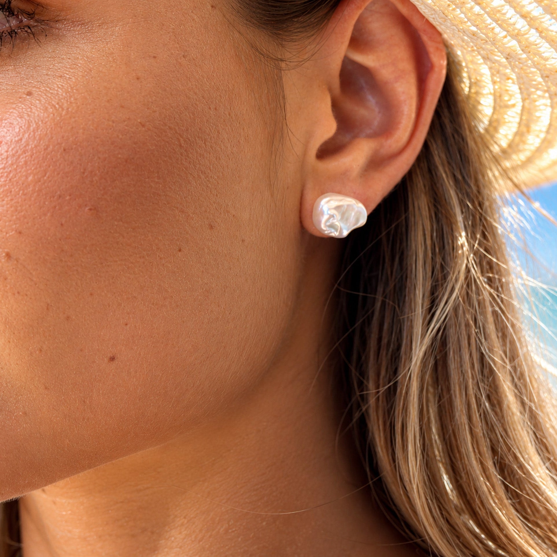 large 12mm baroque freshwater studs on a model designed by lush designs jewellery broome