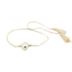 Boho Pearl Cream Tassel Bracelet featuring genuine freshwater pearls and cream tassel detail