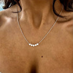 dainty silver chain necklace with 5 small pearls