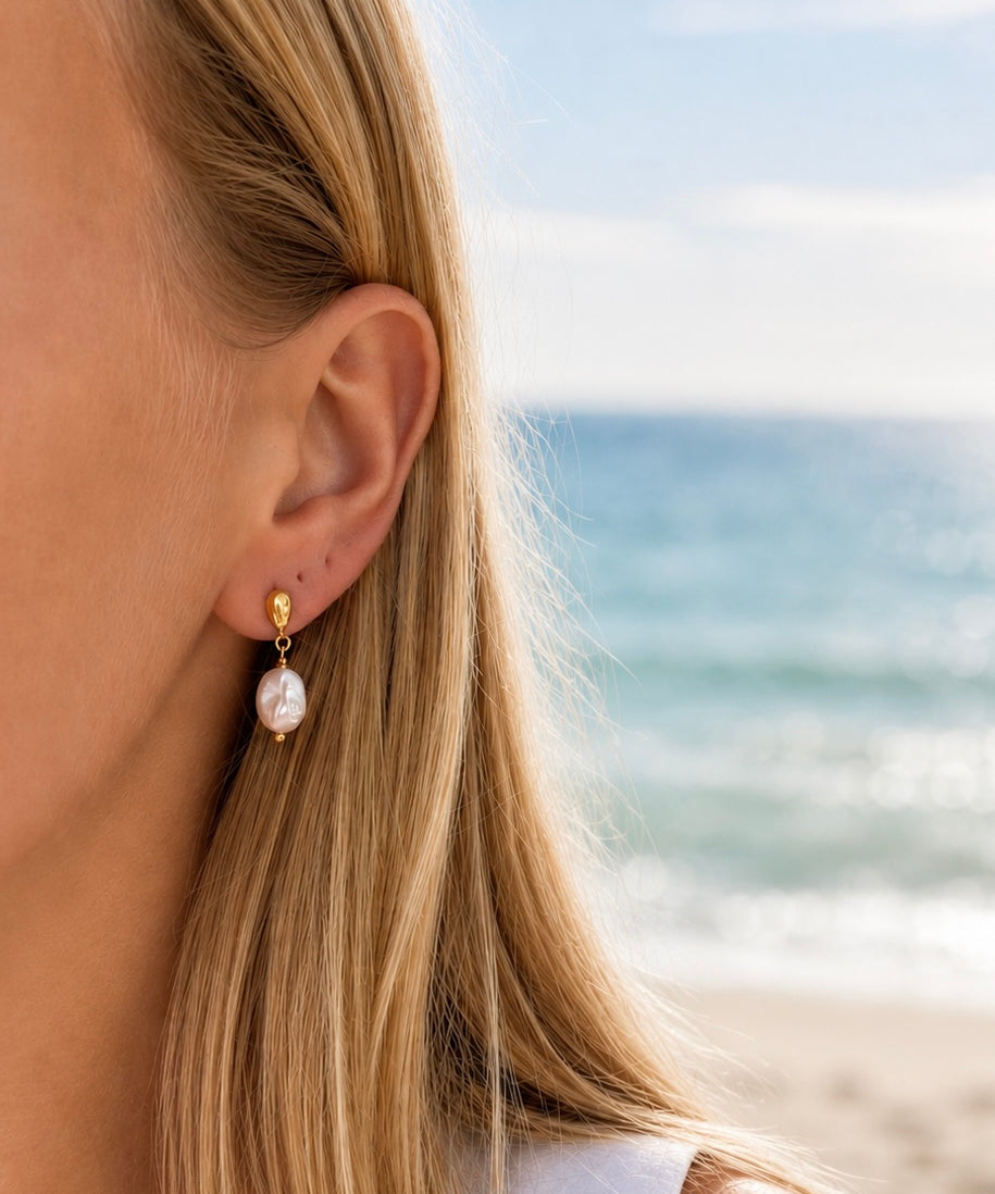 Coastal Dew Drop Baroque Pearl Stud Earrings in gold vermeil worn by model with 10mm freshwater pearl