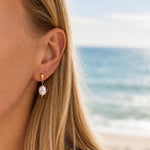 Coastal Dew Drop Baroque Pearl Stud Earrings in gold vermeil worn by model with 10mm freshwater pearl
