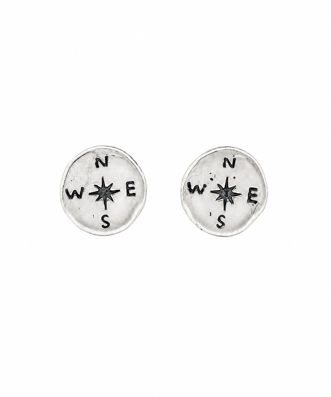 Round studs with a compass engraved 