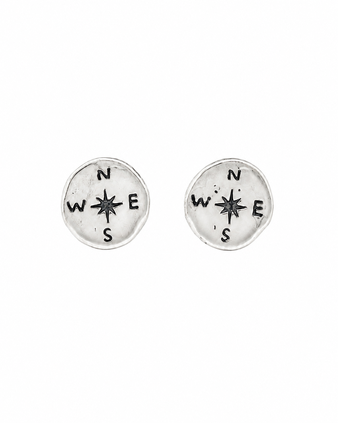 Round studs with a compass engraved 