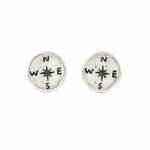 Round studs with a compass engraved 