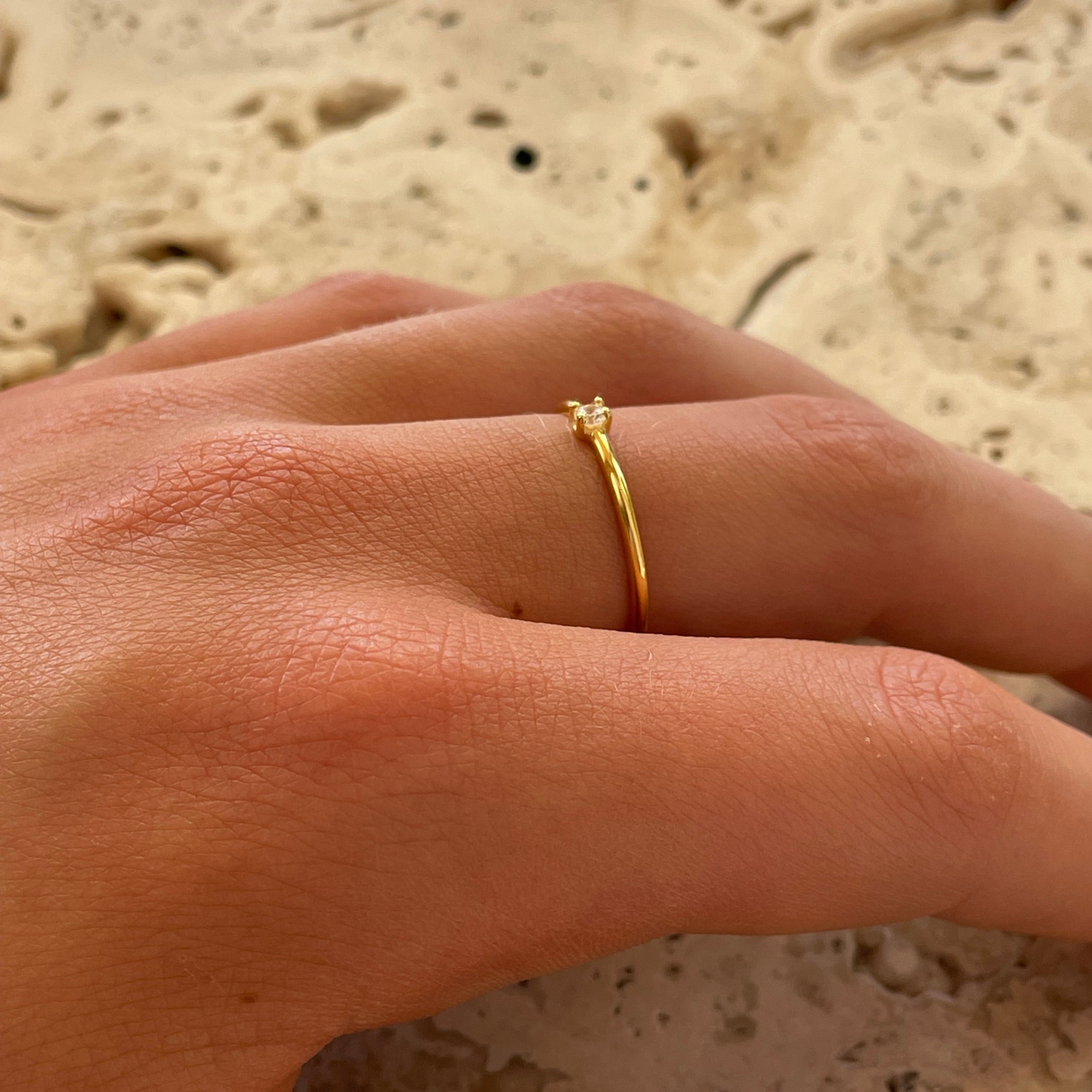 Dainty Zirconia Ring Gold crafted in premium gold vermeil over sterling silver featuring a sparkling cubic zirconia stone.