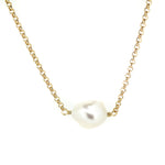 A gold vermeil chain necklace with a single Keshi pearl pendant.
