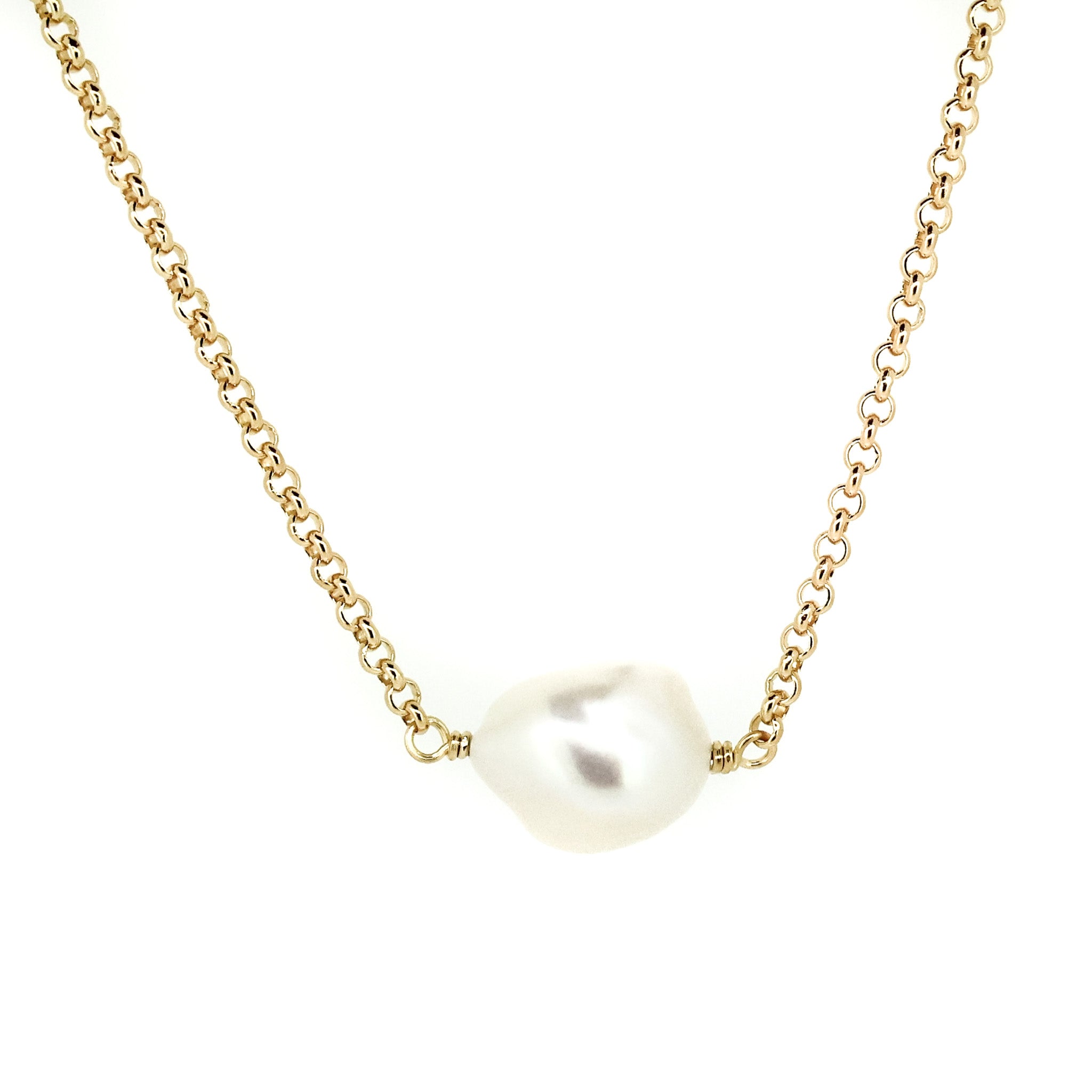 A gold vermeil chain necklace with a single Keshi pearl pendant.