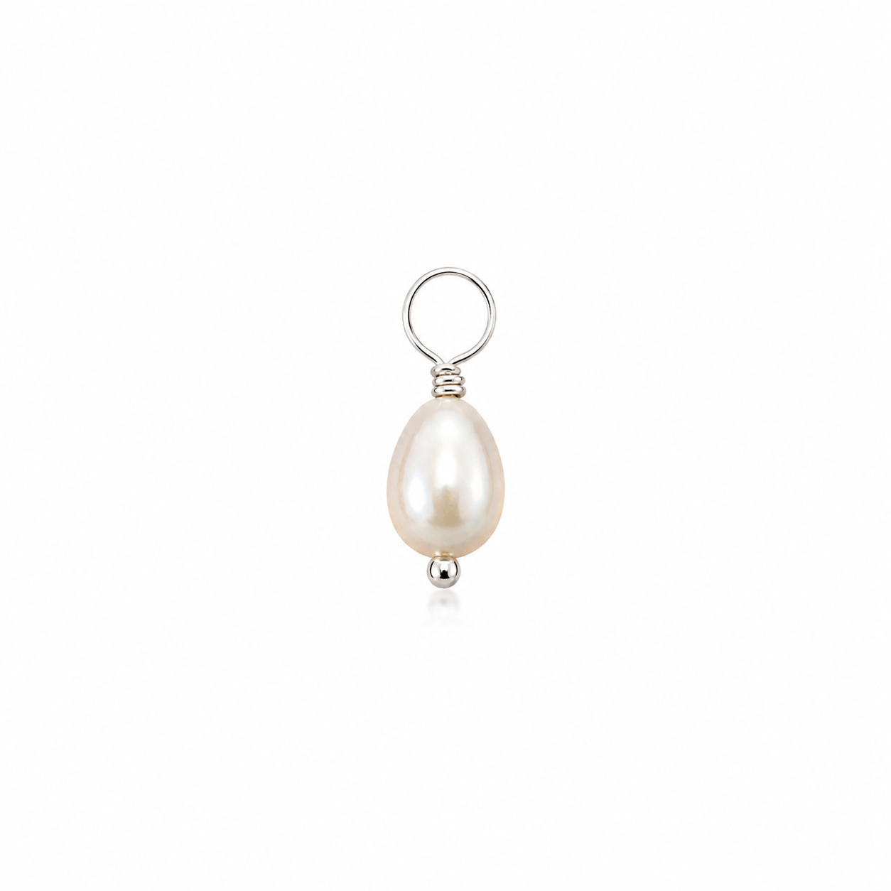 A single teardrop-shaped freshwater pearl pendant in a silver bezel setting with a top loop