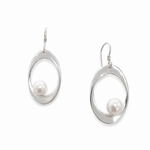 Sterling silver pearl drop earrings featuring organic open teardrop shapes and luminous freshwater pearls, inspired by coastal elegance and designed in Broome, Western Australia.