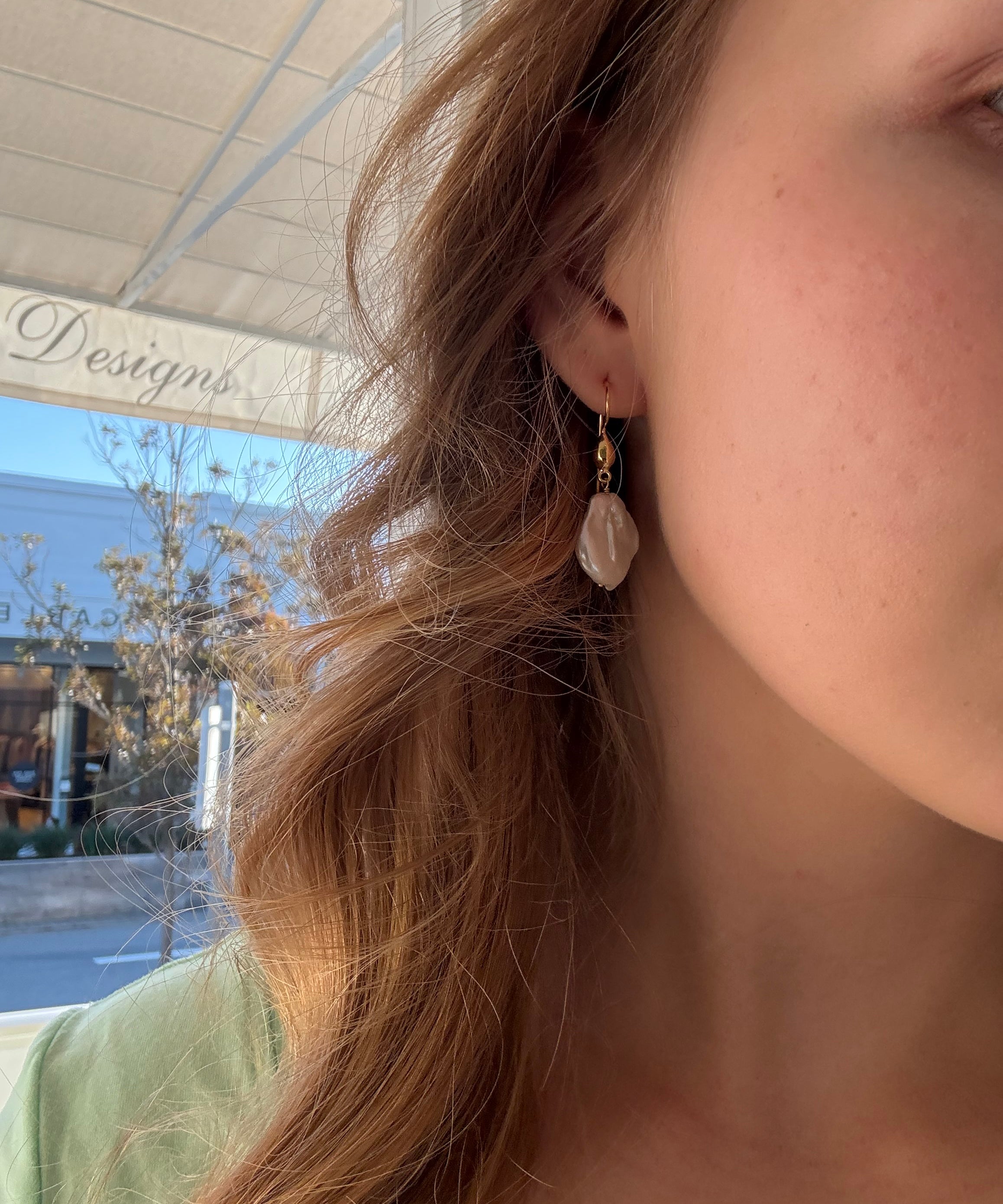Coastal Dew Drop Baroque Pearl Hook Earrings in gold vermeil featuring genuine 15mm freshwater baroque pearls with natural organic shapes.