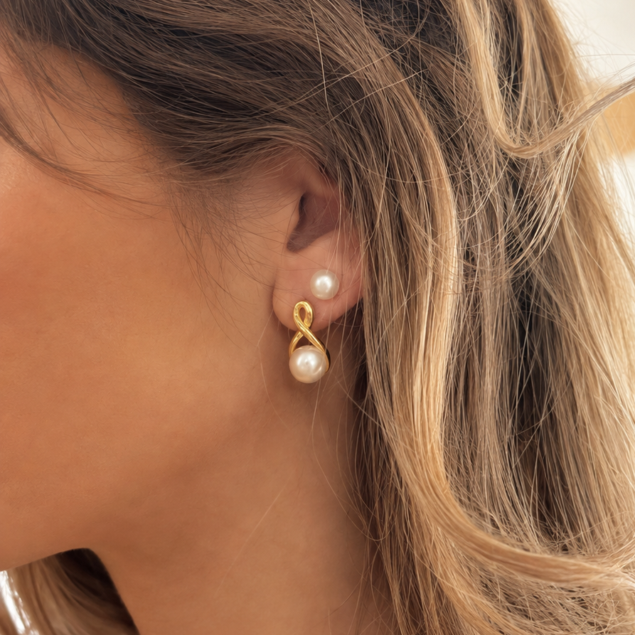 dainty infinity design gold stud earrings with freshwater pearl