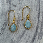 Gold earrings with Larimar teardrop shaped gold hooks 