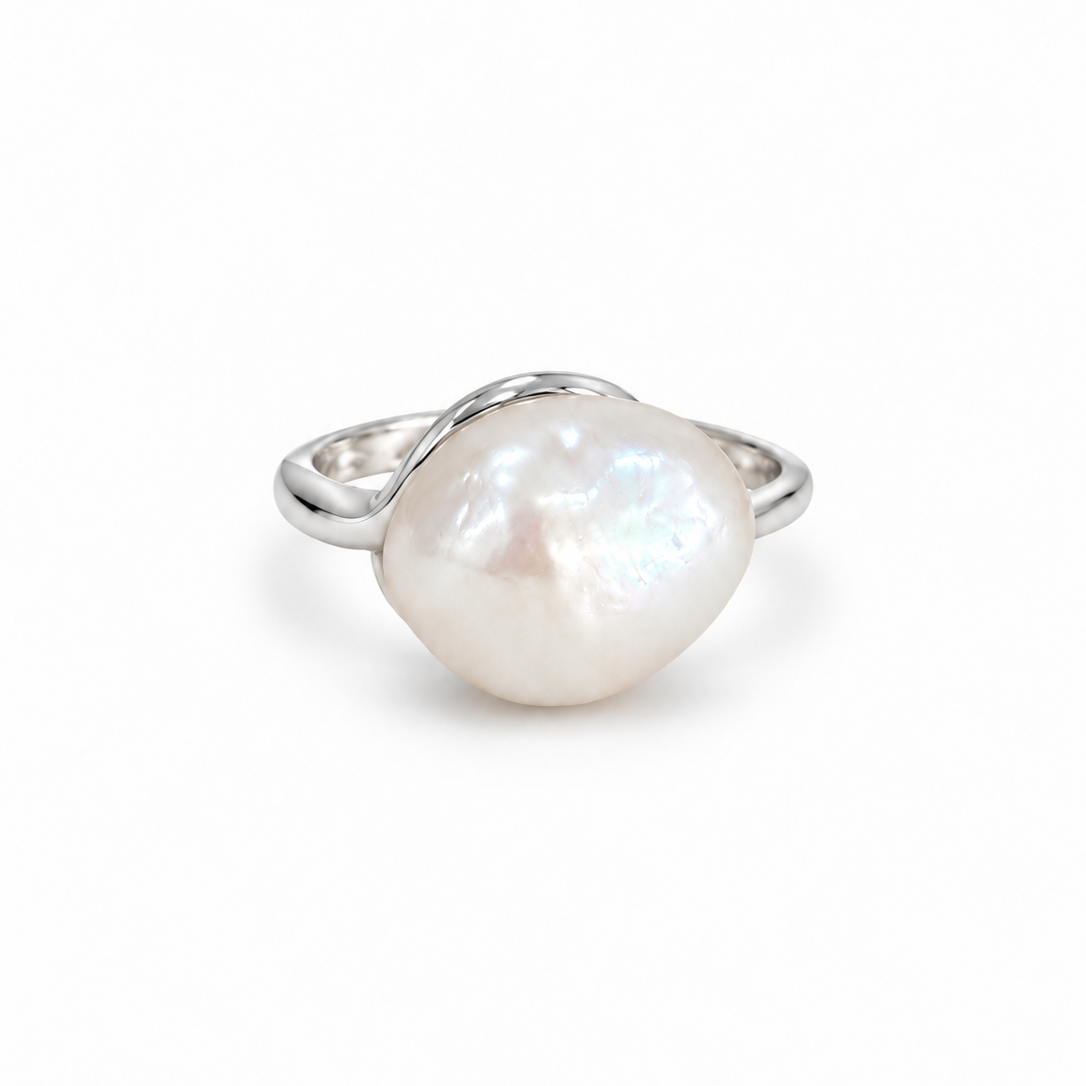 Keshi Embrace Pearl Ring in sterling silver, featuring a luminous natural keshi pearl in an organic sculptural silver setting.