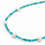 Love Me More 90cm Light Blue Apatite Keshi Pearl Necklace featuring aqua blue gemstone beads, natural white keshi pearls and sterling silver details by Lush Designs Jewellery.