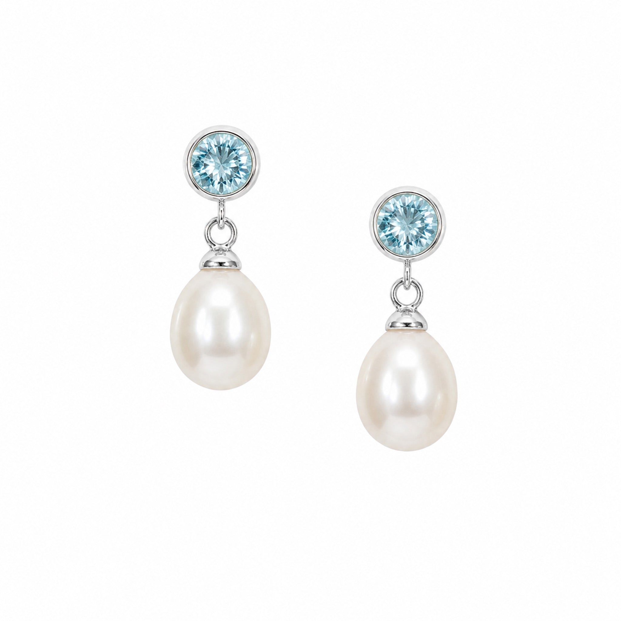 Ocean Blue Topaz Pearl Drop Studs in sterling silver with 6mm bezel-set blue topaz and 12mm white freshwater pearls