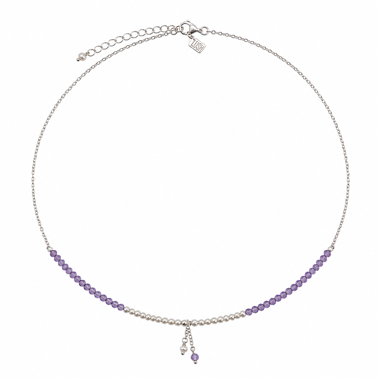 A delicate silver chain necklace featuring a curved row of small purple beads on each side, with a central section of white pearls and a dangling charm, shown on a plain white background.