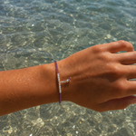 Ocean Spell Pearl Bracelet Amethyst featuring genuine amethyst gemstones, freshwater pearls and sterling silver accents on an adjustable bracelet.