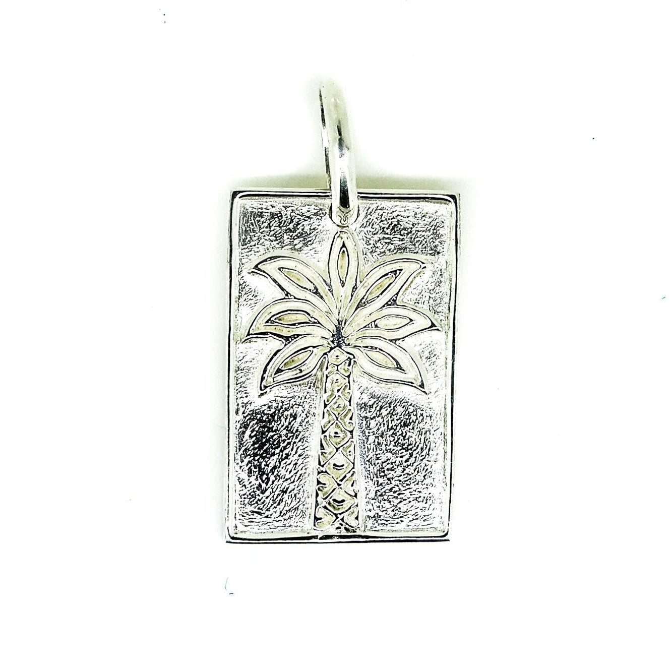 rectangle shaped silver pendant with palm tree design Broome