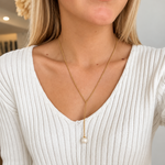 Ricki Pearl Necklace Gold by Lush Designs featuring a delicate gold vermeil Y-shaped chain with a single white freshwater pearl drop