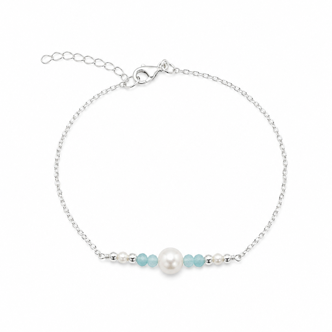 Sea Dreams Pearl Light Blue Apatite Silver Anklet featuring a central freshwater pearl, light blue apatite gemstones and dainty pearl accents on a 925 sterling silver chain by Lush Designs Jewellery.