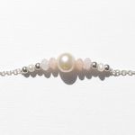 Sea Dreams Pearl Bracelet Pink Opal in 925 sterling silver with genuine freshwater pearl, soft pink opal gemstones, silver tassel details, and adjustable chain
