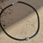 Necklace with a pearl pendant