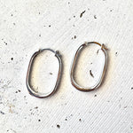 Sterling silver oval hoop earrings with a beachy coastal design, Australian jewellery designed in Broome