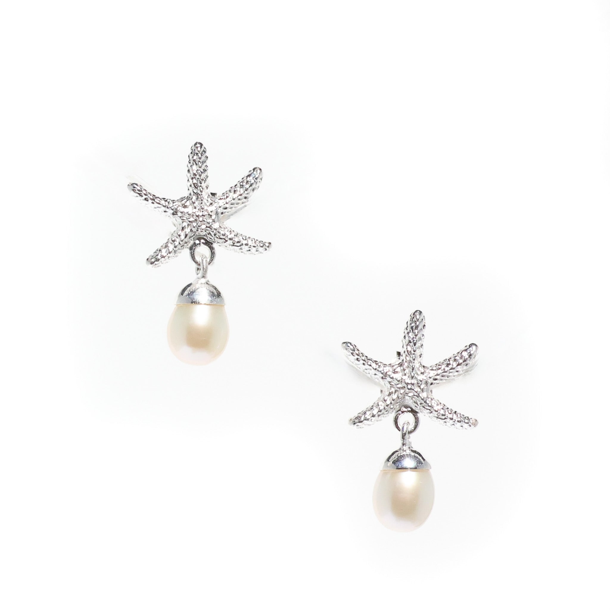 A pair of silver stud earrings featuring a starfish design with a freshwater pearl dangling below each earring.