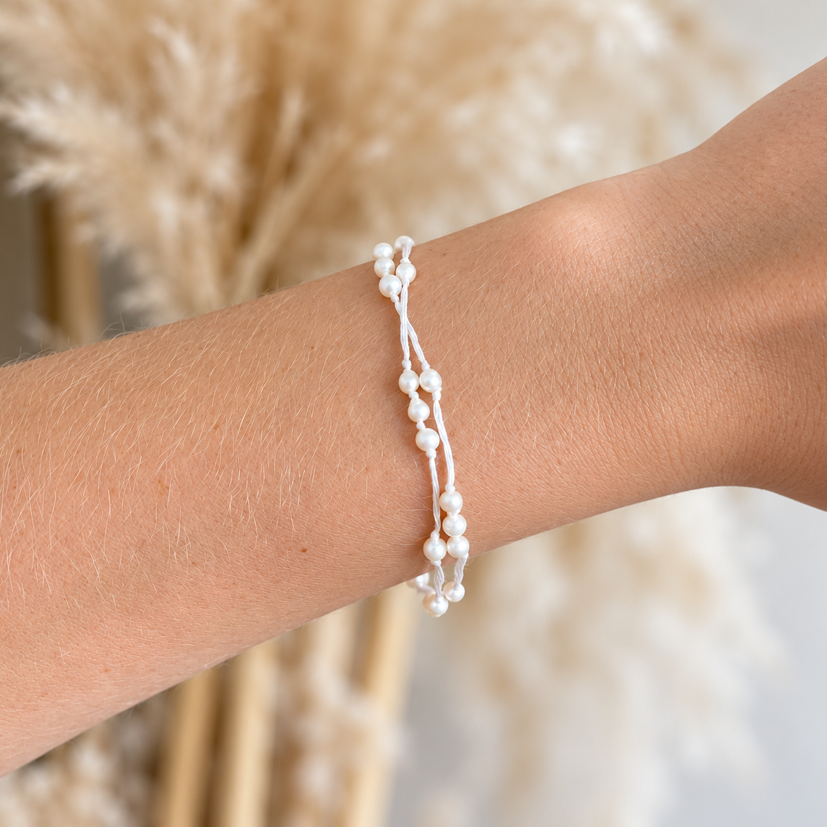 Model wearing Summer Sun Pearl Bracelet White freshwater pearl bracelet by Lush Designs Jewellery
