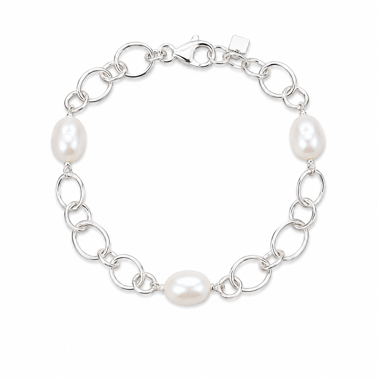 Freshwater pearl bracelet with chunky sterling silver chain links, with a soft coastal-inspired look.