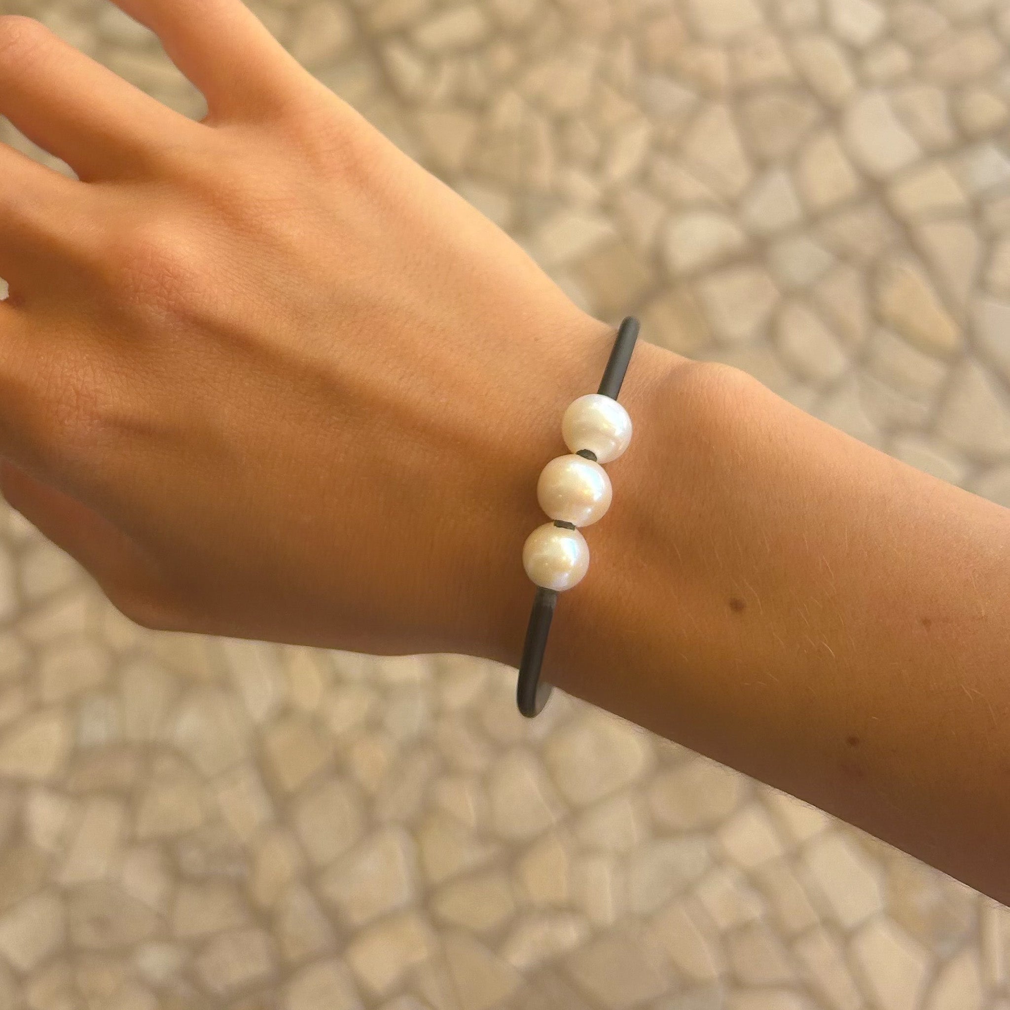 Triple pearl bracelet worn on wrist – coastal Australian jewellery