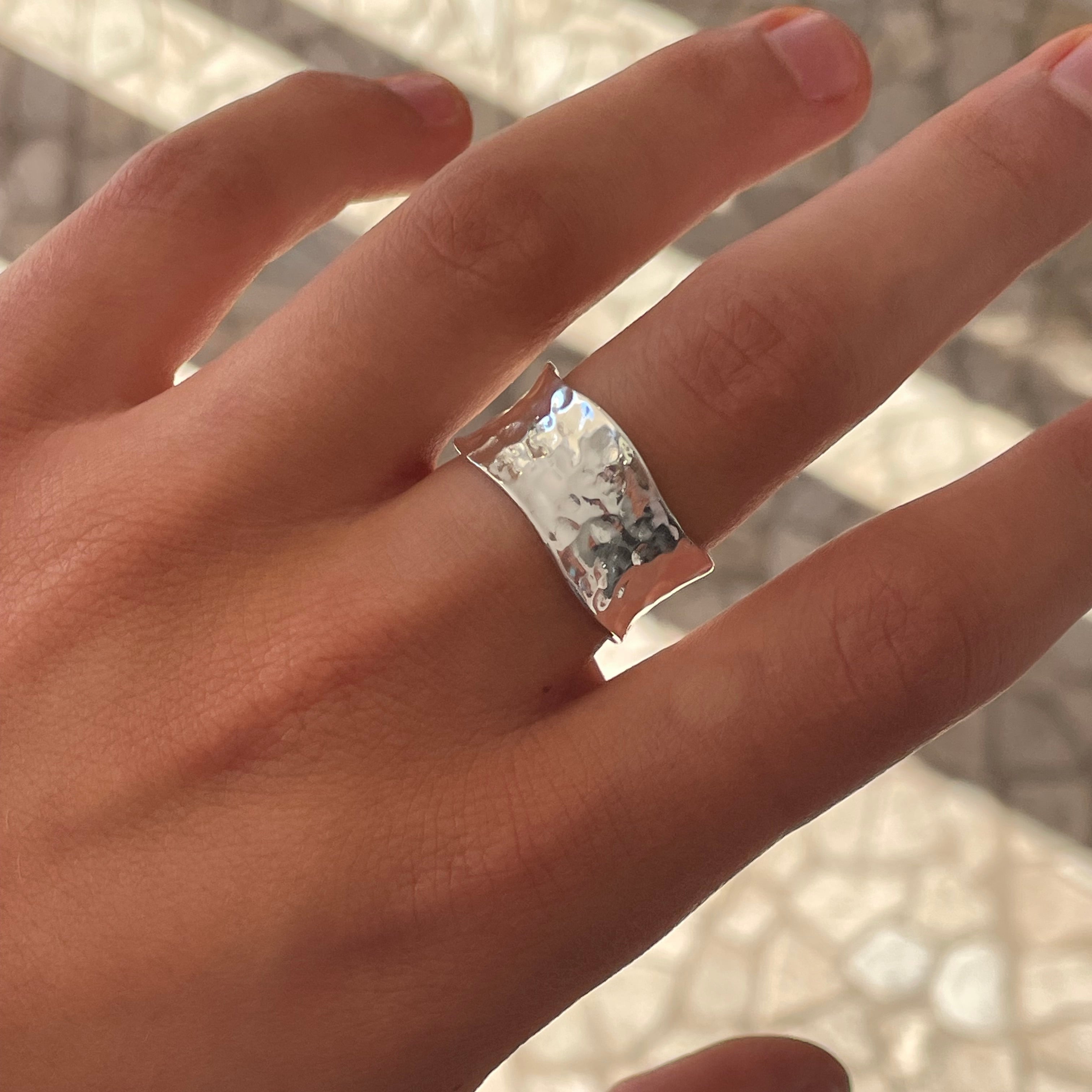 Sterling silver Tidal Flow ring featuring a contemporary wave-inspired sculptural design, designed in Broome Western Australia