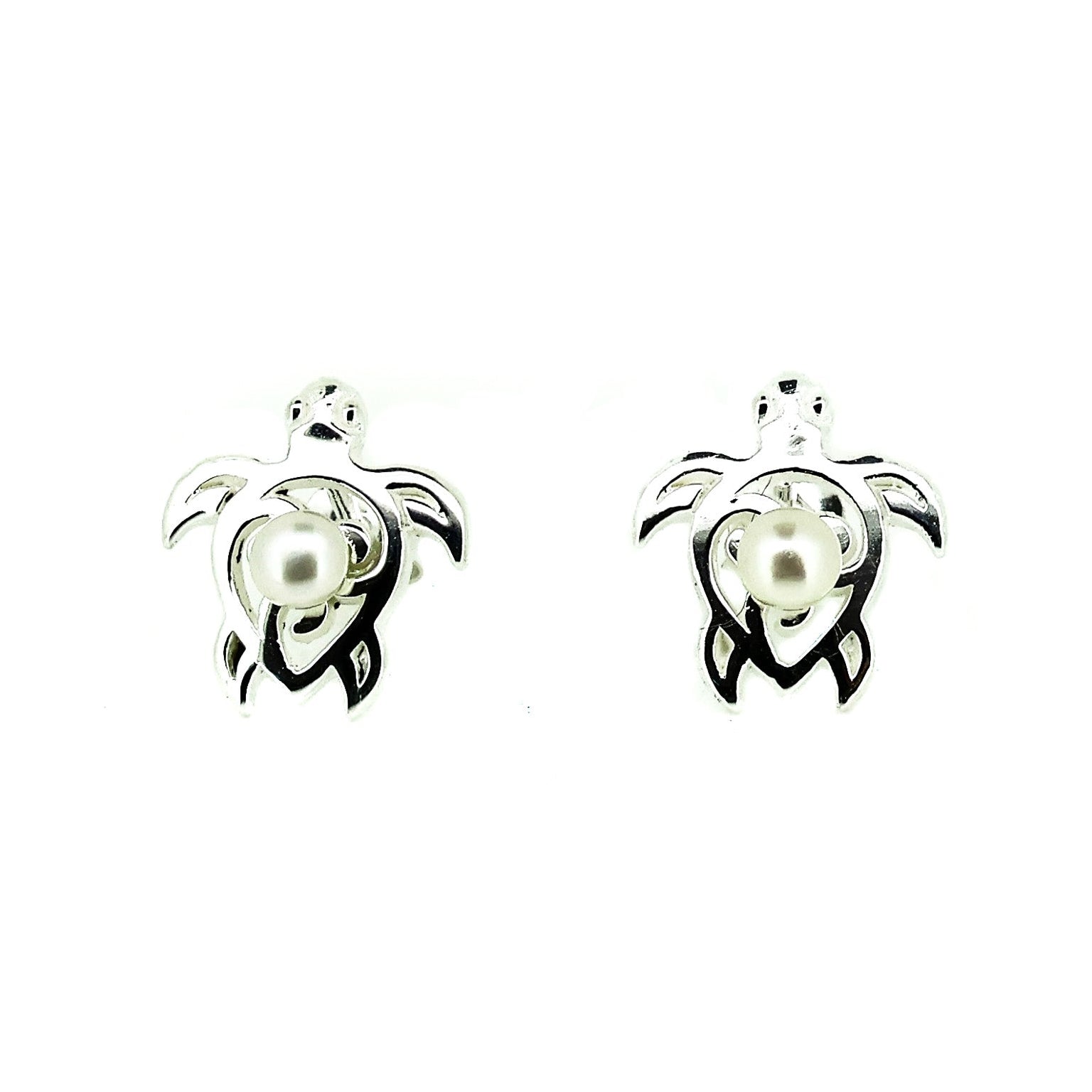 Pair of turtle-shaped earrings with pearl centers on a white background