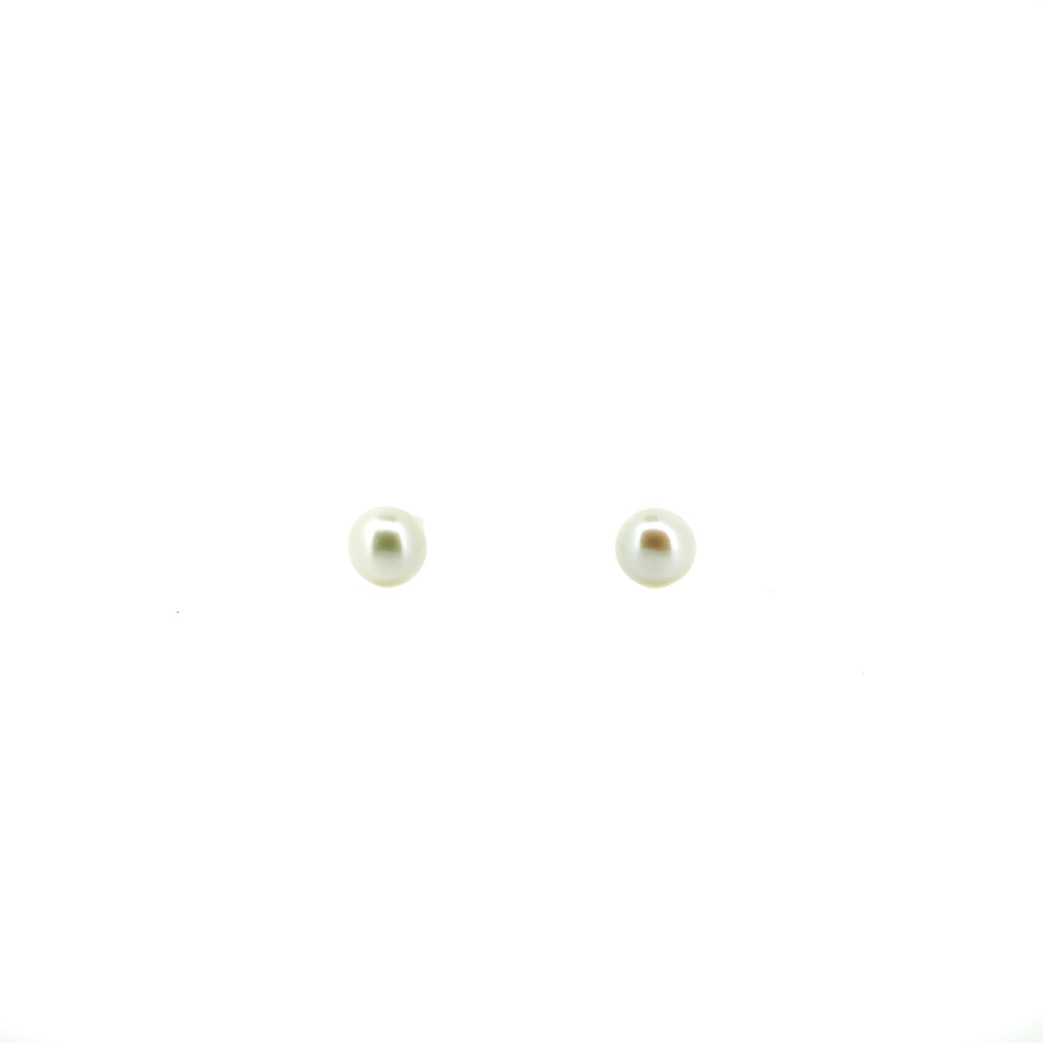 white pearl 5mm studs In sterling silver 
