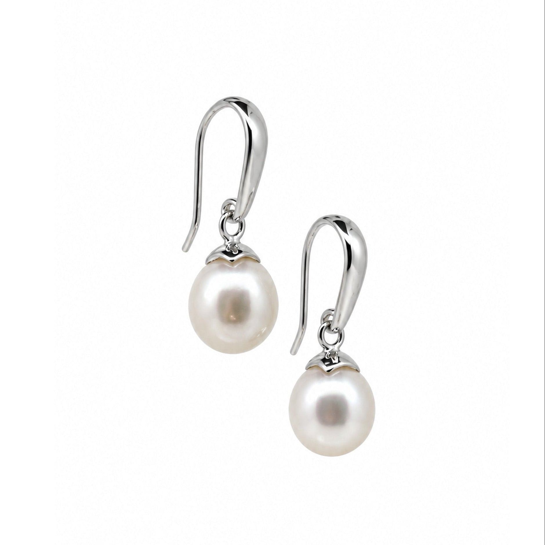 A pair of silver drop earrings with a single round white pearl suspended below a polished silver fishhook ear wire, shown on a plain white background.