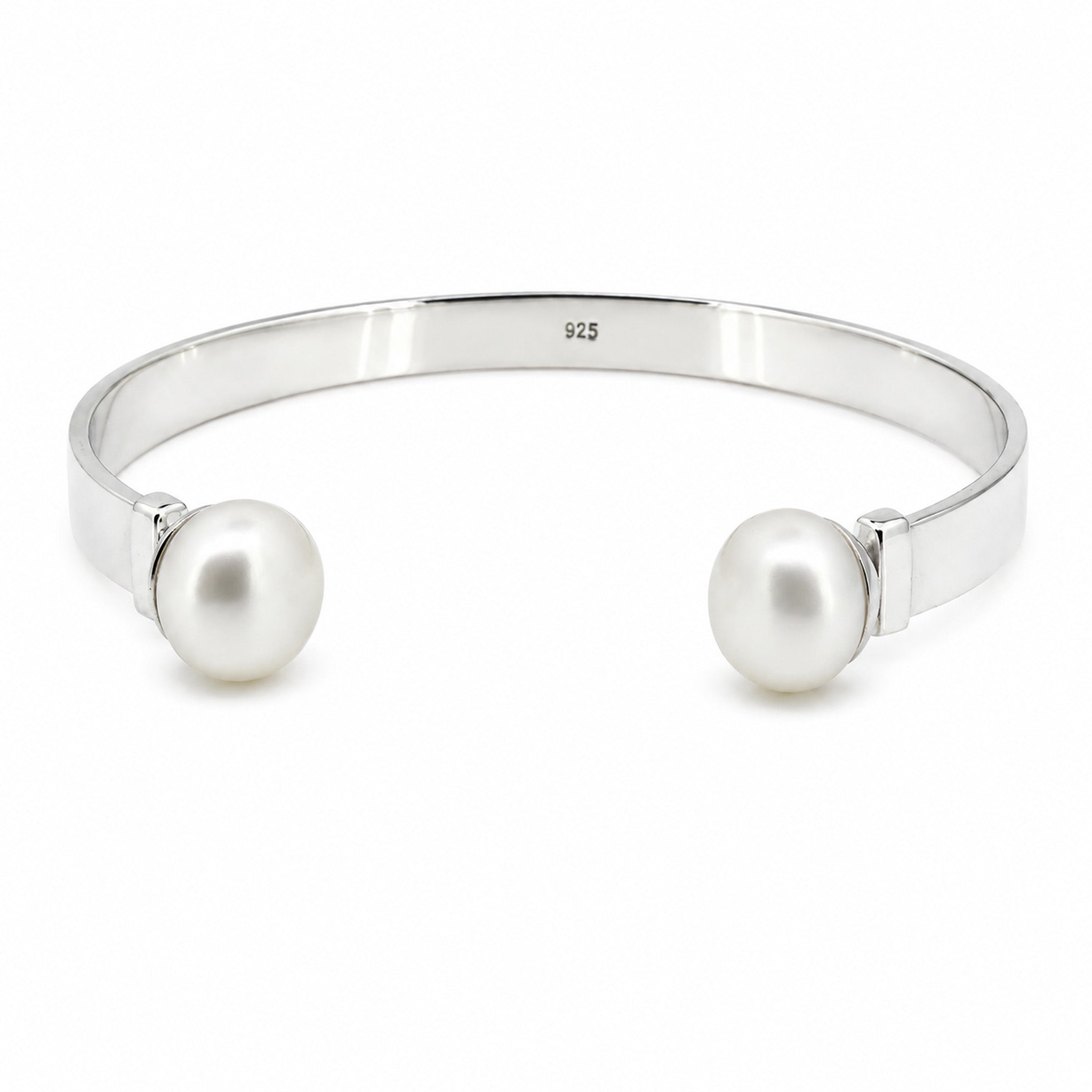 bold and elegant sterling silver cuff with pearl detail designed by lush designs jewellery broome
