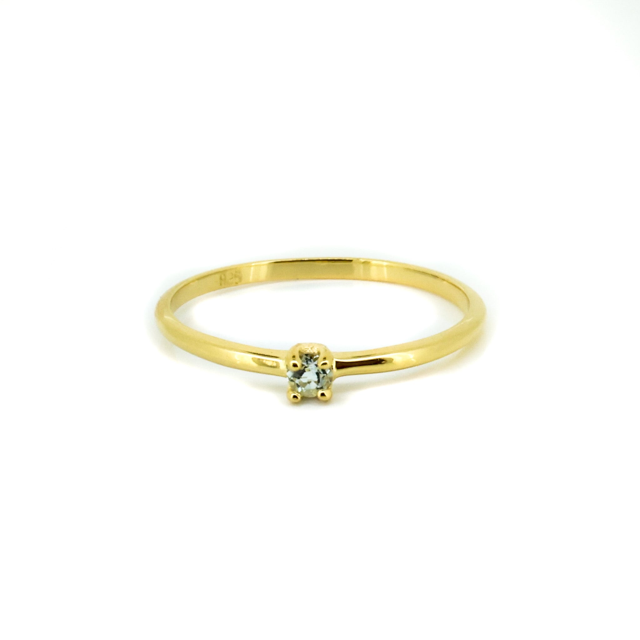 Gold vermeil ring featuring a 4mm blue topaz gemstone, beach-inspired jewellery designed in Broome Western Australia