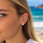 women wearing freshwater baroque pearl studs set in sterling silver designed in broome australia
