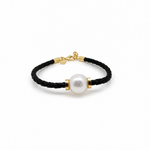 Beach Black Braid Pearl Bracelet Gold featuring a white baroque pearl and gold fittings on a white background