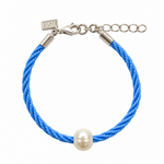 Children’s Pearl Bracelet Dark Blue featuring a natural white freshwater pearl on a dark blue braided cord with sterling silver clasp, adjustable extension chain and signature LUSH tag. Coastal-inspired children's jewellery by Lush Designs Jewellery Australia.