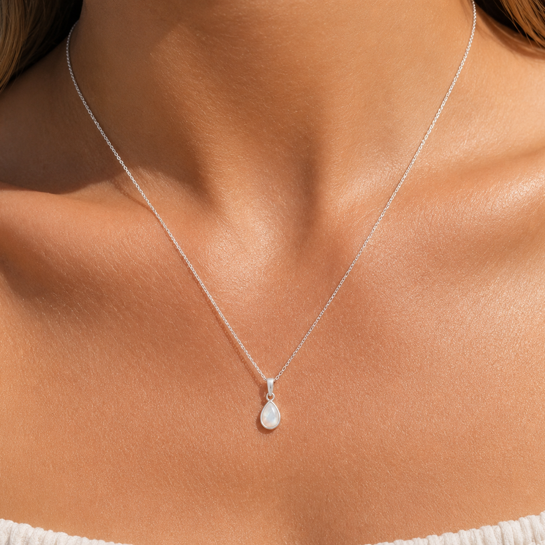 dainty pendant in the shape of morning dew drop infilled with mother of pearl shell designed in broome western australia by lush designs jewellery
