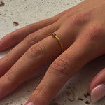 dainty gold ring with amethyst gemstone