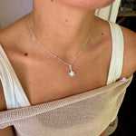 Small sterling silver frangipani flower pendant polished finish