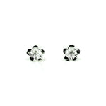 A pair of sterling silver frangipani stud earrings against a white background.