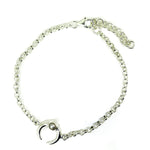silver bracelet with a cescent moon and pearl detail