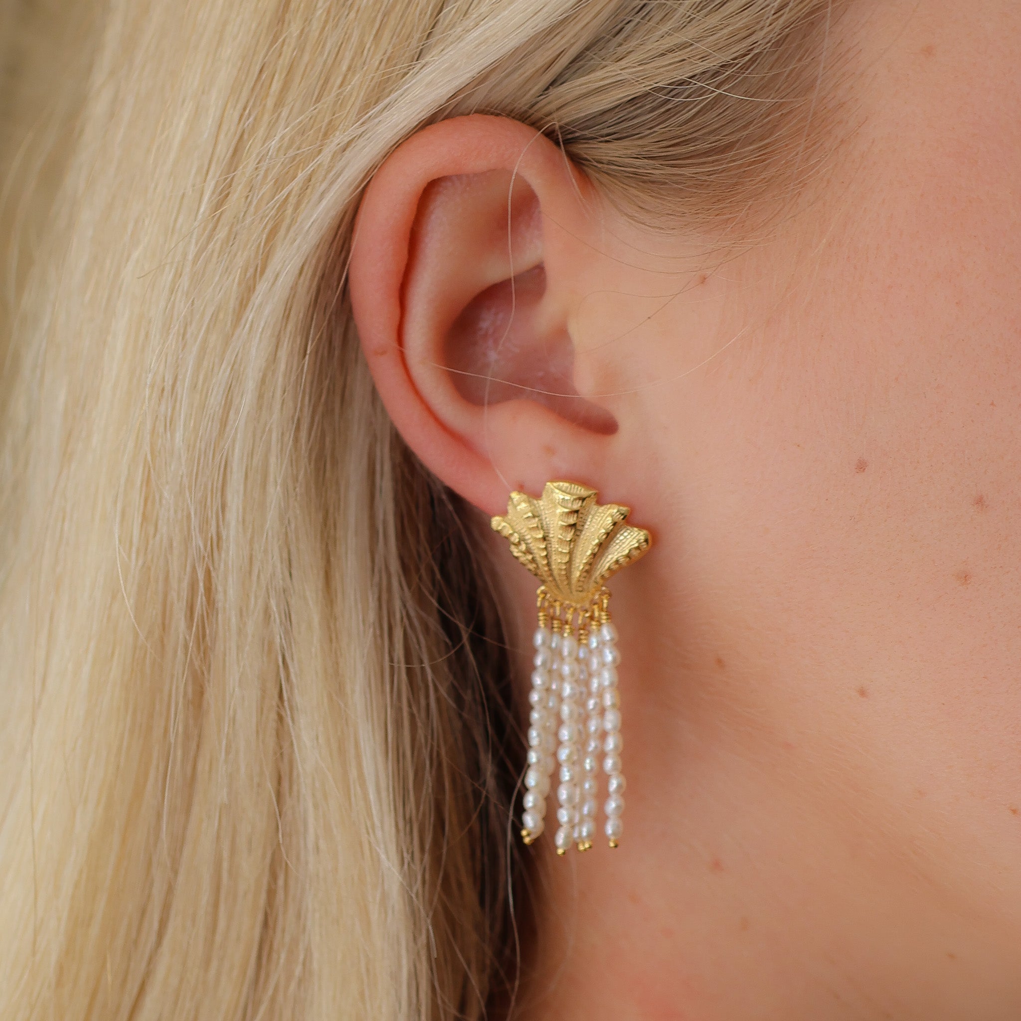 statement golden shell earrings designed in broome