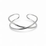 Infinity Sterling Silver Cuff featuring intertwined smooth and textured bands on a white background.