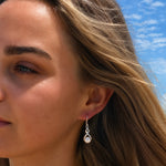 infinity sterling silver hook earrings with freshwater pearl designe din broome western australia